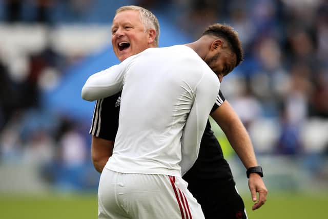 HAPPY DAYS: Sheffield United boss Chris Wilder and Blades forward Lys Mousset embrace after last year's clash with Chelsea at Stamford Bridge. Picture: James Wilson/Sportimage