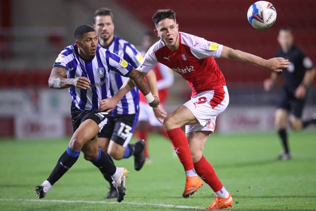 TAKE A BREAK: Rotherham United's George Hirst, right,and Sheffield Wednesday's Liam Palmer battle for the ball during recent Championship derby between the two at New York Stadium. Picture: Alex Pantling/Getty Images