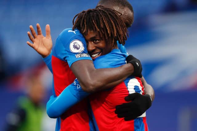 SET PIECE: Eberechi Eze of Crystal Palace celebrates with teammate Cheikhou Kouyate after scoring a first-half free kick for the hosts. Picture: Matthew Childs/Getty Images.