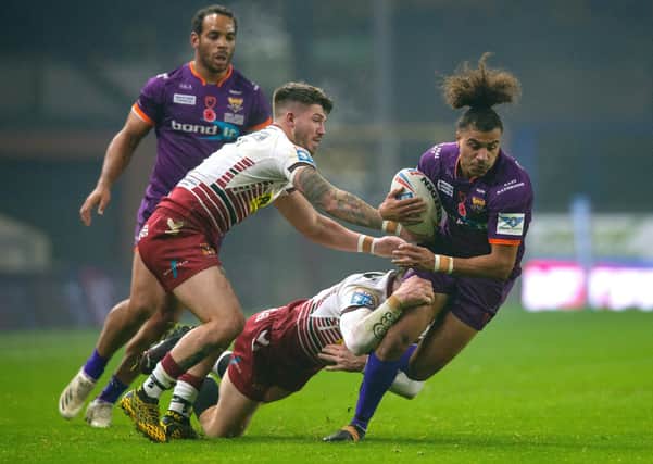 Ashton Golding is stopped by Oliver Gildart and Jackson Hastings.

(Picture: Bruce Rollinson)