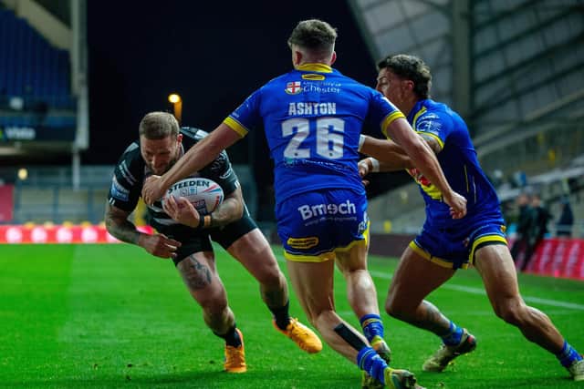 Try time: Josh Griffin scores Hull's opening try in September's defeat by Warrington. Picture Bruce Rollinson
