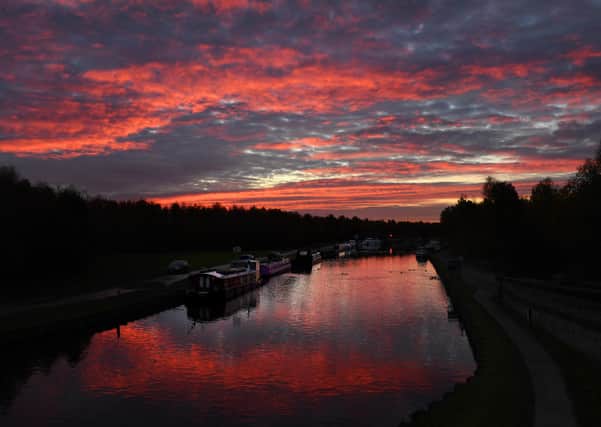 The sun rises at Lemonroyd Lock, Woodlesford, Leeds on November 5, 2020. Picture by Simon Hulme