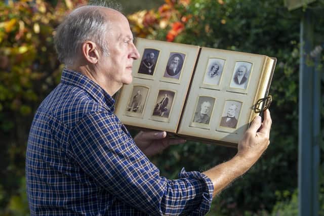 Steve with the portraits of Charlotte Bronte and her father Patrick Bronte. Picture: Tony Johnson