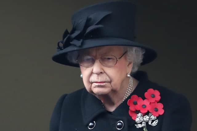 The Queen watched the Remembrance Sunday service from a Foreign Office balcony.