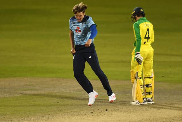 Sam Curran of England celebrates the wicket of Pat Cummins of Australia  during the 2nd Royal London One Day International Series match between England and Australia at Emirates Old Trafford on September 13, 2020 (Picture:Gareth Copley/Getty Images for ECB)