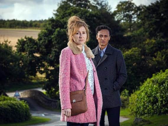 Laurel Thomas (played by Charlotte Bellamy) and her partner Jai (Chris Bisson). Credit: ITV.