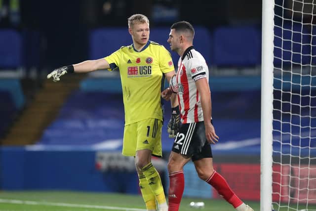 FALLING BEHIND:  Aaron Ramsdale of Sheffield United speaks with John Egan of Sheffield United after conceding a second goal during the Premier League match between Chelsea and Sheffield United at Stamford Bridge. Picture: Peter Cziborra - Pool/Getty Images.