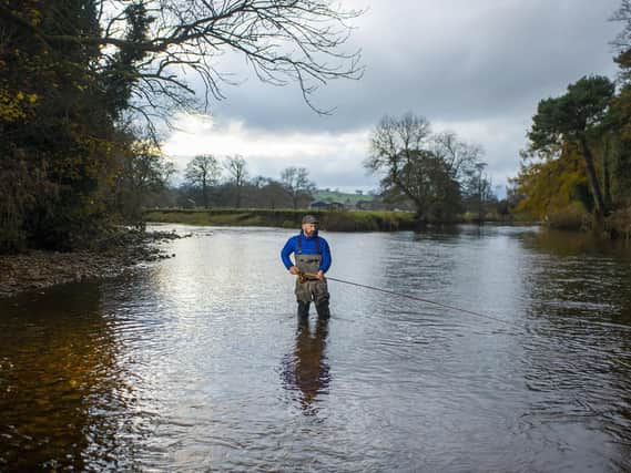 Fishing guide Philip Ellis in the River Ure at East Witton