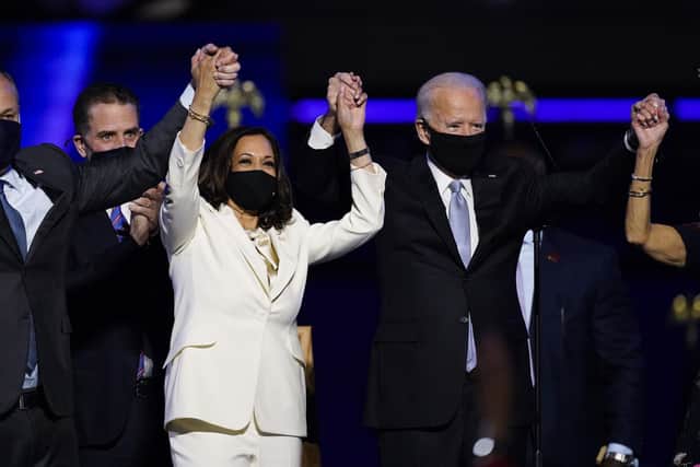 President-elect Joe Biden and his family with Vice President-elect Kamala Harris.