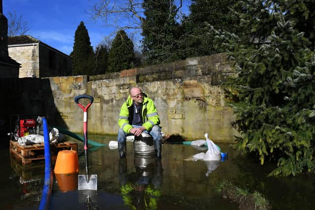 Kirkby Wharfe resident Pete Mitchell in his flooded garden in February.
