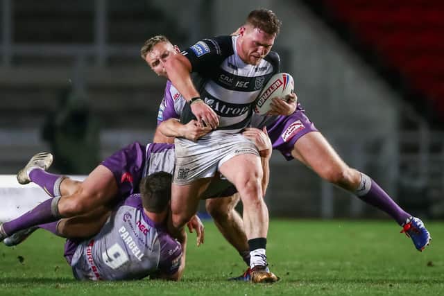 DETERMINED: Hull FC’s Scott Taylor, seen above in action against local rivals Hull KR, is determined to help his team win a Grand Final. Picture by Alex Whitehead/SWpix.com