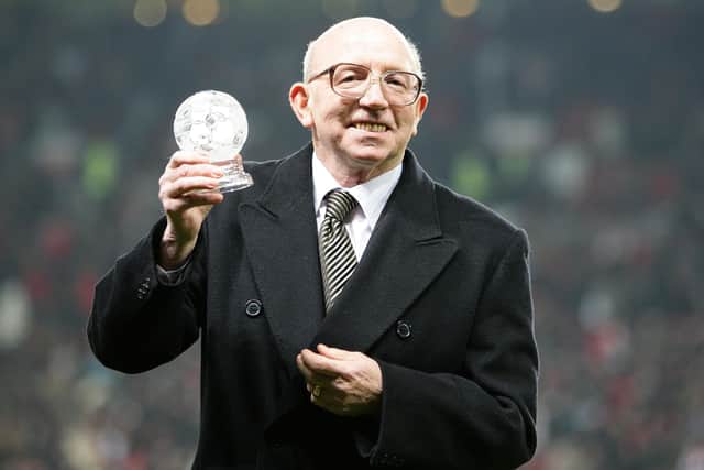 1966 World Cup winner Nobby Stiles is presented with an award on the pitch prior to kick off. Stiles has died aged 78 after a long illness (Picture: Martin Rickett/PA Wire)