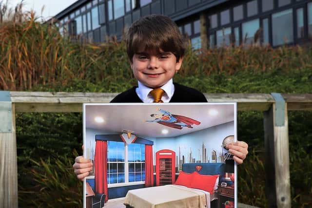 Pictured, Joshua Jessop, 12, who despite living with the life-limiting genetic muscle-wasting condition, each day goes to Richmond School, with a smile on his face.