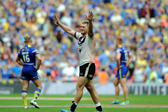 HIGH EMOTION: Hull's Scott Taylor in tears at full-time after helping Hull FC beat Warrington Wolves to win the Challenge CUp at WEmbley in 2016. 
Picture: Jonathan Gawthorpe