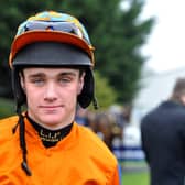 Jockey Tommy Dowson partners Little Bruce at Cheltenham today against dual Grand National hero Tiger Roll.
