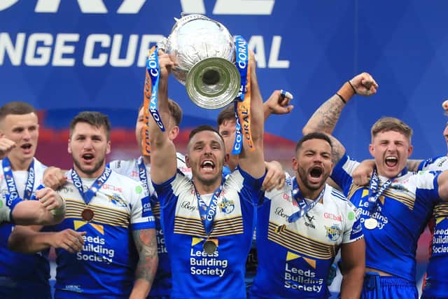 Leeds Rhinos' Luke Gale lifts the trophy after the Coral Challenge Cup Final at Wembley. Picture: Mike Egerton/PA