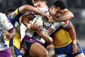Melbourne Storm's Albert Vete is tackled in the game against Parramatta Eels (Cameron Spencer/Getty Images)