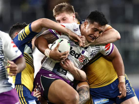 Melbourne Storm's Albert Vete is tackled in the game against Parramatta Eels (Cameron Spencer/Getty Images)