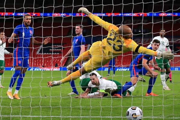 Republic of Ireland goalkeeper Darren Randolph dives in vain as England's Harry Maguire (second right) scores his side's first goal. Picture: PA