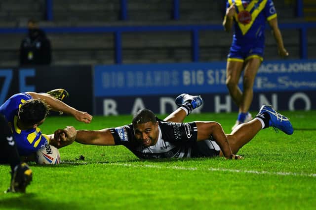 Hull's Chris Satae stretches over for the match-winning try v Warrington. (PIC: JONATHAN GAWTHORPE)