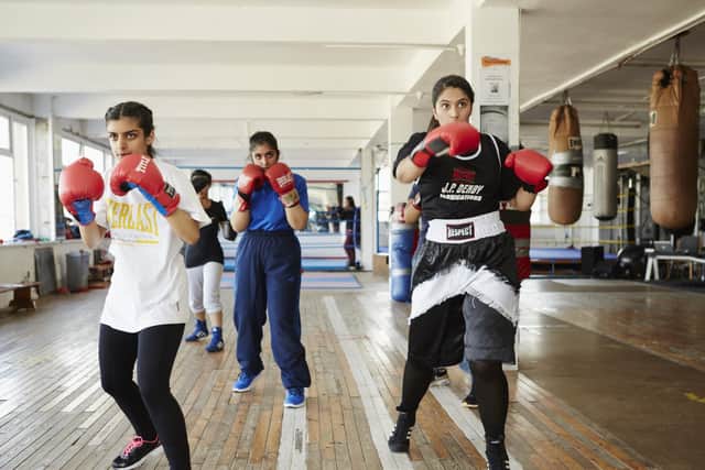 Rehearsals for No Guts, No Heart, No Glory, Common Wealth’s 2014 production about young Muslim women boxers. (Picture: Christopher Nunn).