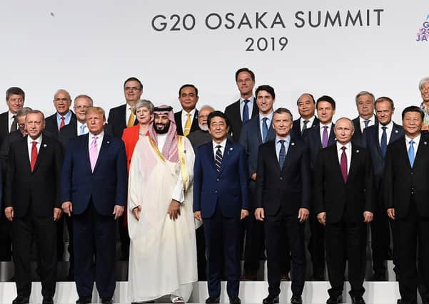 Leaders of the G20 Summit pose for the family photo in Osaka, Japan in June 2019. Picture: Andy Rain/PA Wire