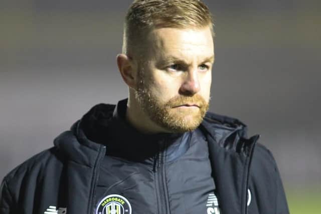 Harrogate Town manager Simon Weaver was not in attendance at the EnviroVent Stadium.