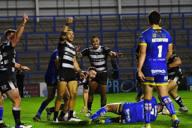 MAGIC MOMENT: Hull FC's Jake Connor (centre) and his team-mates show their delight after scoring a late try in Thursday night's win over Warrington. Picture : Jonathan Gawthorpe