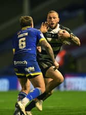 DIFFERENCE MAKER: Hull FC's Josh Griffin fends off Warrington's Blake Austin during Thursday's play-off clash. Picture: Jonathan Gawthorpe