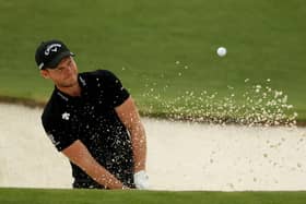 Sheffield's Danny Willett plays a shot from a bunker on the 18th hole.  (Photo by Patrick Smith/Getty Images)