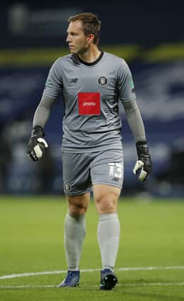 SAFE HANDS: Harrogate Town goalkeeper Joe Cracknell, pictured during the Carabao Cup clash against West Bromwich Albion at The Hawthorns in September. Picture: Andrew Couldridge - Pool/Getty Images.