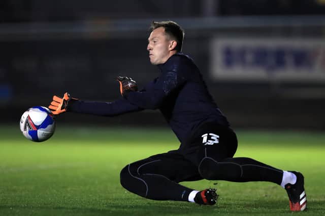 SPECIAL NIGHT: Harrogate Town's Joe Cracknell warms up ahead of the EFL Trophy clash against his former club Hull City at the CNG Stadium on Tuesday night. Picture: George Wood/Getty Images