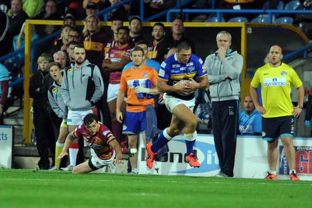 Ryan Hall on his way to scoring the try against Huddersfield in 2015 which won the league leaders' shield for Leeds. Picture by Steve Riding.