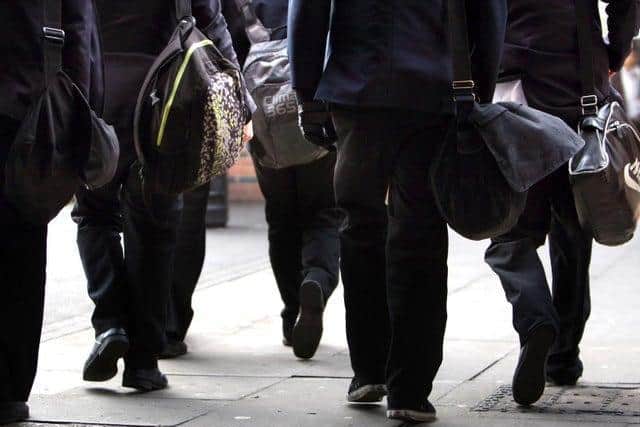 A new report has today warned that schools in the North would see big improvements in their rankings if government league tables took pupils’ background into account when measuring their progress. Photo credit: PA