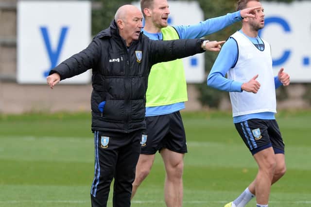 STARTING OUT: Tony pulis gets his point across to Sheffield Wednesday's players during training on Monday. picture: swfc/Steve Ellis.