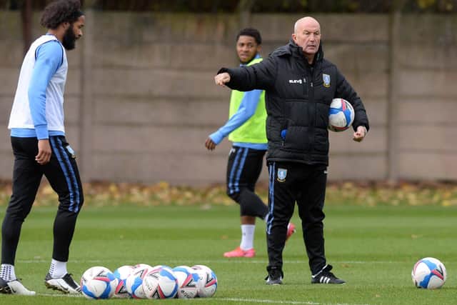 THIS IS THE WAY: TOny Pulis at training with Sheffield Wednesday's players on Monday. Picture: swfc