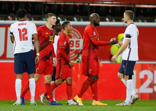 Belgium's Thomas Meunier, Youri Tielemans and Romelu Lukaku shake hands with England's Eric Dier after the UEFA Nations League League A, Group 2 clash on Sunday. Picture: Bruno FAHY/PA