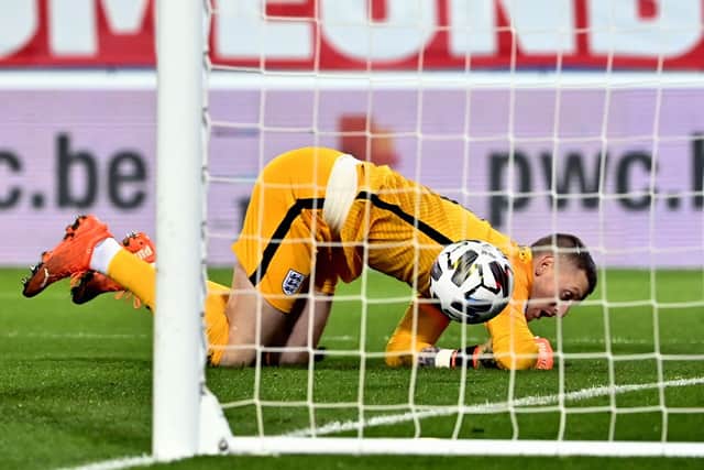 England's goalkeeper Jordan Pickford fails to stop Belgium's Dries Mertens' free-kick at King Power Stadion. Picture: DIRK WAEM/PA