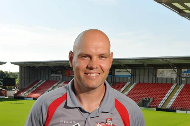 On the brink: Coach Kieron Purtill, who helped Huddersfield Giants to the 2013 League Leaders’ Shield, has helped take Hull FC within 80 minutes of the Grand Final.