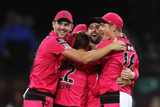 Sydney Sixers' players celebrate victory over Melbourne Stars in the Big Bash League Final at the SCG in February. Picture: Mark Kolbe/Getty Images