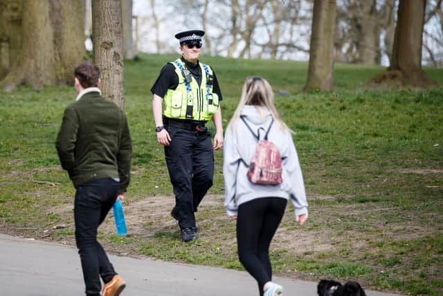 A police officer on patrol in Roundhay Park, Leeds, during the lockdown