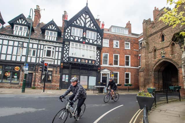 Cyclists in Beverley town centre, East Riding of Yorkshire