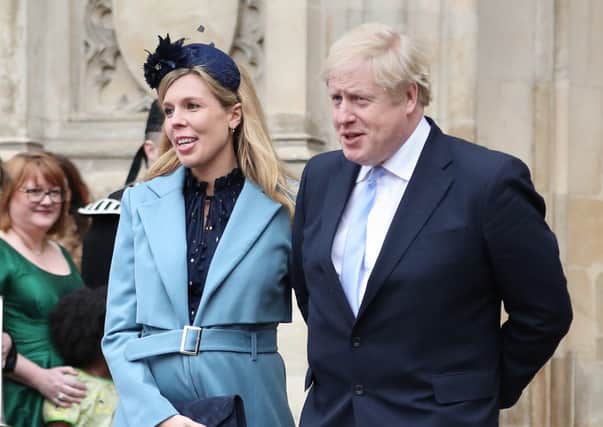 Prime Minister Boris Johnson and partner Carrie Symonds. Photo: Yui Mok/PA Wire