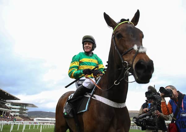 Cheltenham queen: Now-retired jockey Barry Geraghty aboard Epatante following their victory in the Unibet Champion Hurdle Challenge Trophy at Cheltenham in March.