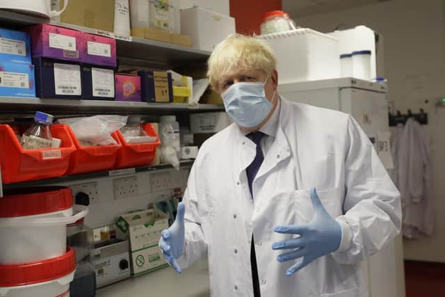 Prime Minister Boris Johnson during a visit to the Jenner Institute in Oxford, where toured the laboratory and met scientists who are leading the COVID vaccine research. Photo: Kirsty Wigglesworth/PA Wire