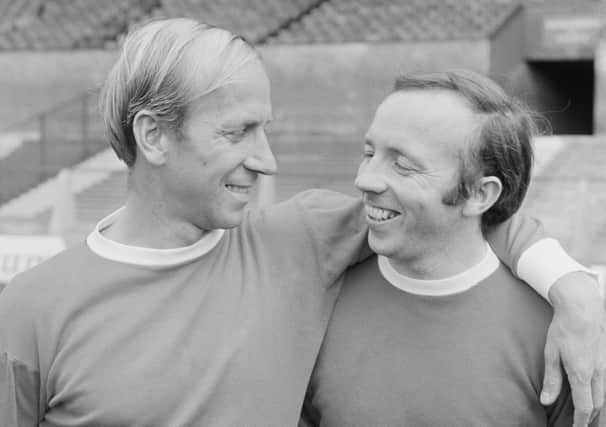 English football legends Bobby Charlton and Nobby Stiles. (Photo by Evening Standard/Hulton Archive/Getty Images)