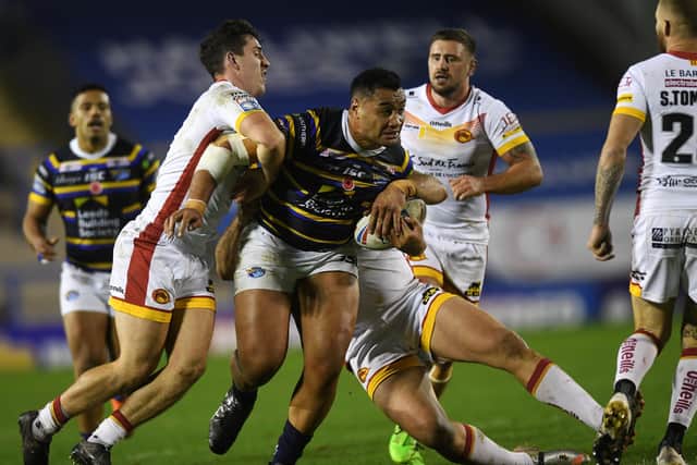 Catalans' Joel Tomkins was judged to have committed the offence during last Friday's Super League play-off win against Leeds Rhinos,. above. 
 Picture: Jonathan Gawthorpe
