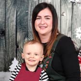 Little Alfie Powell pictured with his mum Emma during his chemotherapy treatment