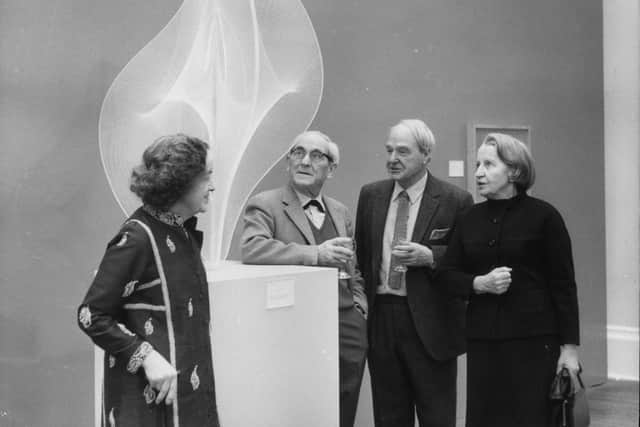 10th March 1970:  From left to right, sculptors Dame Barbara Hepworth (1903 - 1975), Naum Gabo (1890 - 1977), Henry Moore (1898 - 1986), accompanied by Lady Read admire Gabo's plastic sculpture entitled 'Linear Construction No. 2' at the Tate Gallery, London. The three abstract artists have each donated works to the Tate as a tribute to the late Sir Herbert Read, a trustee of the gallery.  (Photo by Douglas Miller/Keystone/Getty Images)