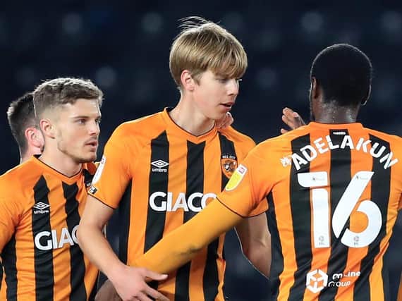 Martin Samuelsen, centre, is congratulated by his Hull City team-mates after opening the scoring in Tuesday's 3-0 EFL Trophy victory over Grimsby Town. Pictures: Getty Images